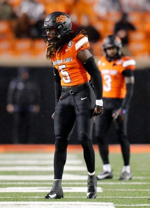 Oklahoma State's Kendal Daniels celebrates in the second half of Saturday's game against Brigham Young at Boone Pickens Stadium in Stillwater.