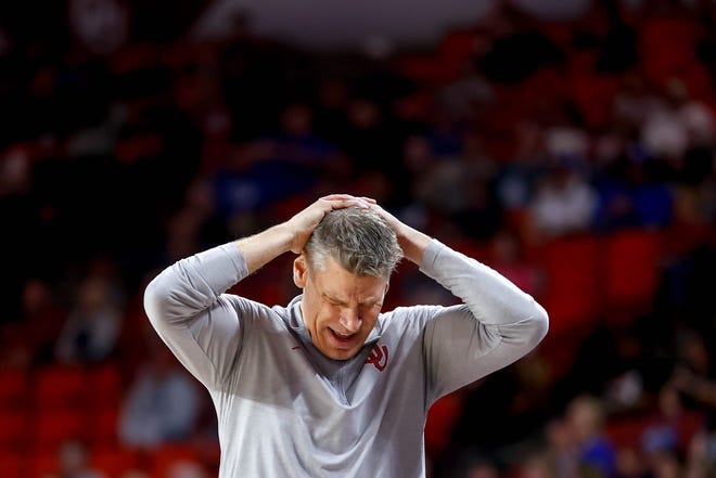 Oklahoma head coach Porter Moser holds his head in his hands in the second half during an NCAA basketball game between University of Oklahoma (OU) and Brigham Young University (BYU) at Lloyd Noble Center in Norman, Okla., on Tuesday, Feb. 6, 2024.