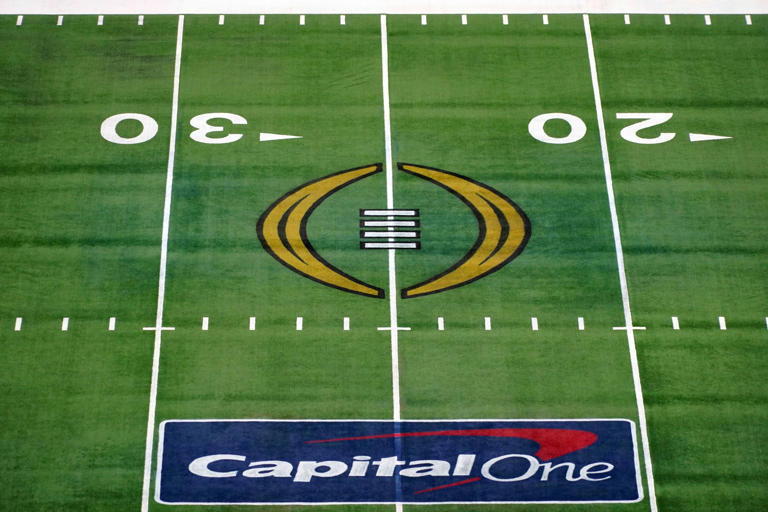 Jan 1, 2021; Arlington, Texas, USA; A general view of the Capitol One and College Football Playoff (CFP) logo on the field during the Rose Bowl between the Alabama Crimson Tide and the Notre Dame Fighting Irish at AT&T Stadium. Kirby Lee-USA TODAY Sports