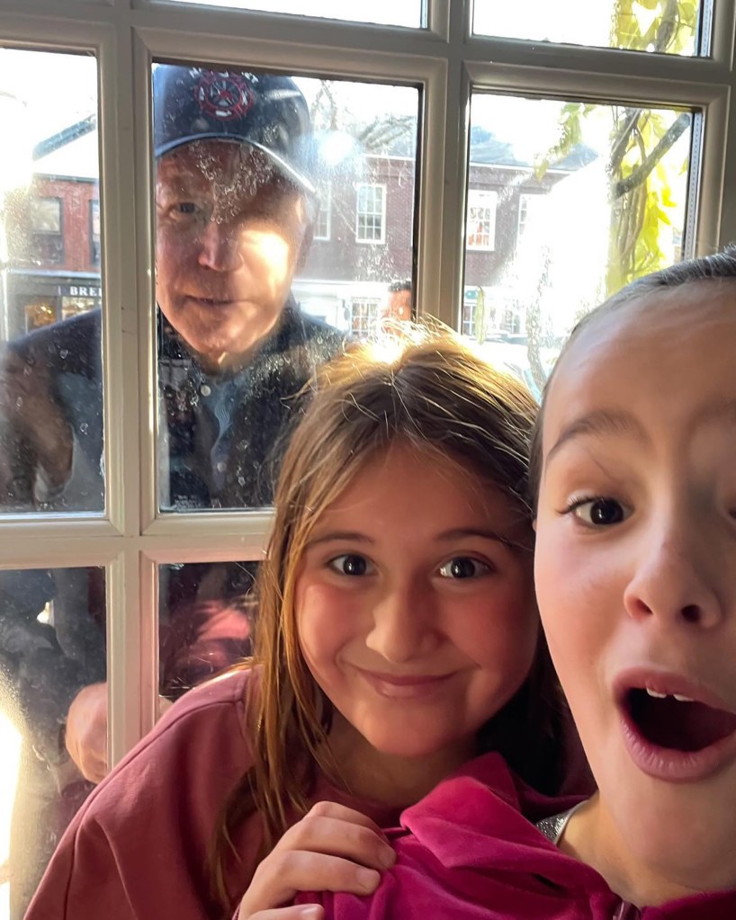 Biden takes a selfie with kids.