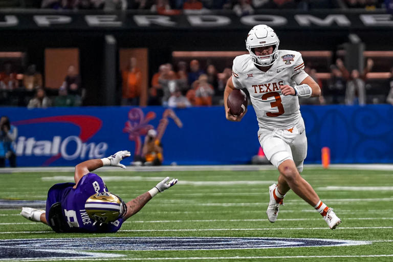 Texas Longhorns quarterback Quinn Ewers (3) evades a tackle by Washington edge Bralen Trice (8) during the Sugar Bowl College Football Playoff semifinals game at the Caesars Superdome on Monday, Jan. 1, 2024 in New Orleans, Louisiana. © Aaron E. Martinez/American-Statesman / USA TODAY NETWORK